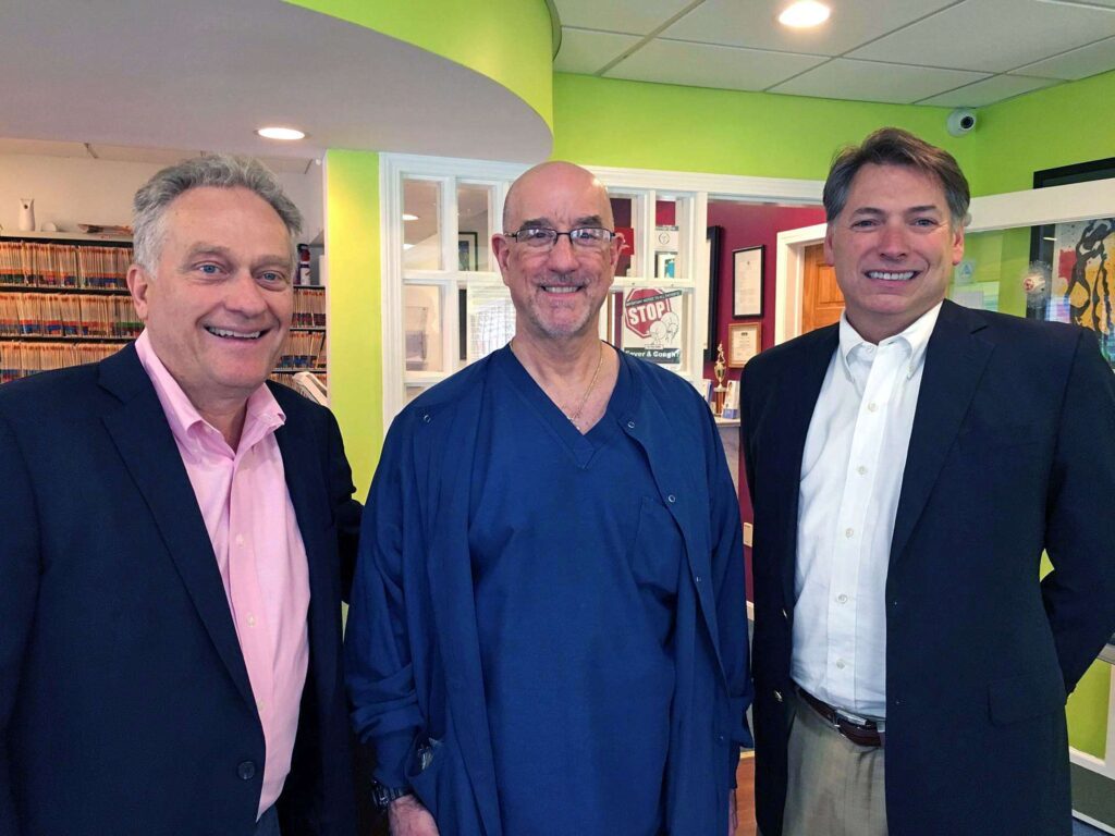 Photo of Drs. Keith Gjebre, Martin Kaplan, and Greg Lane at Dr. Kaplan's office.